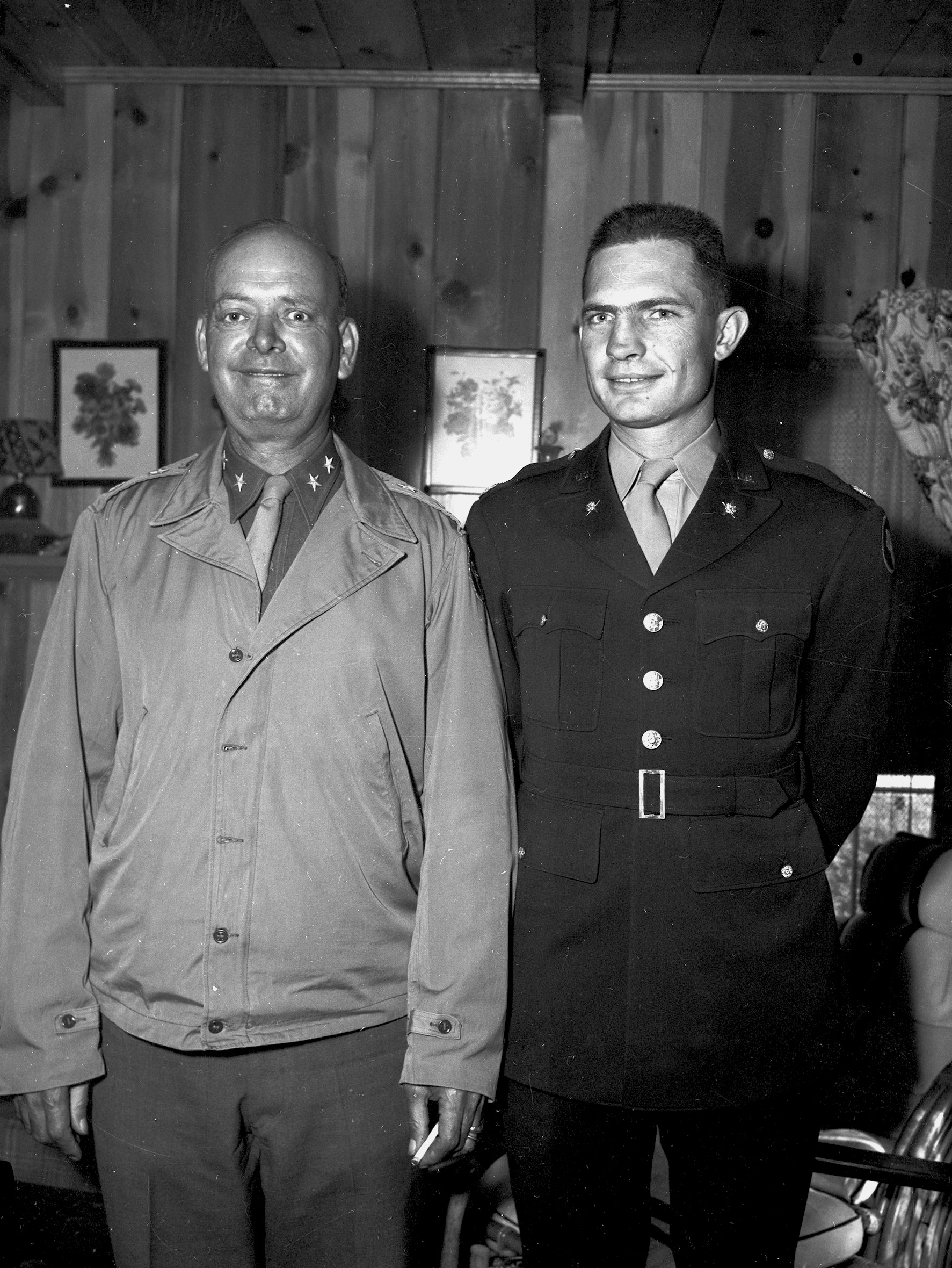 Major General Gilbert R. Cook, left and Major William Boydstun, right. Both are wearing WWII military uniforms of their rank.