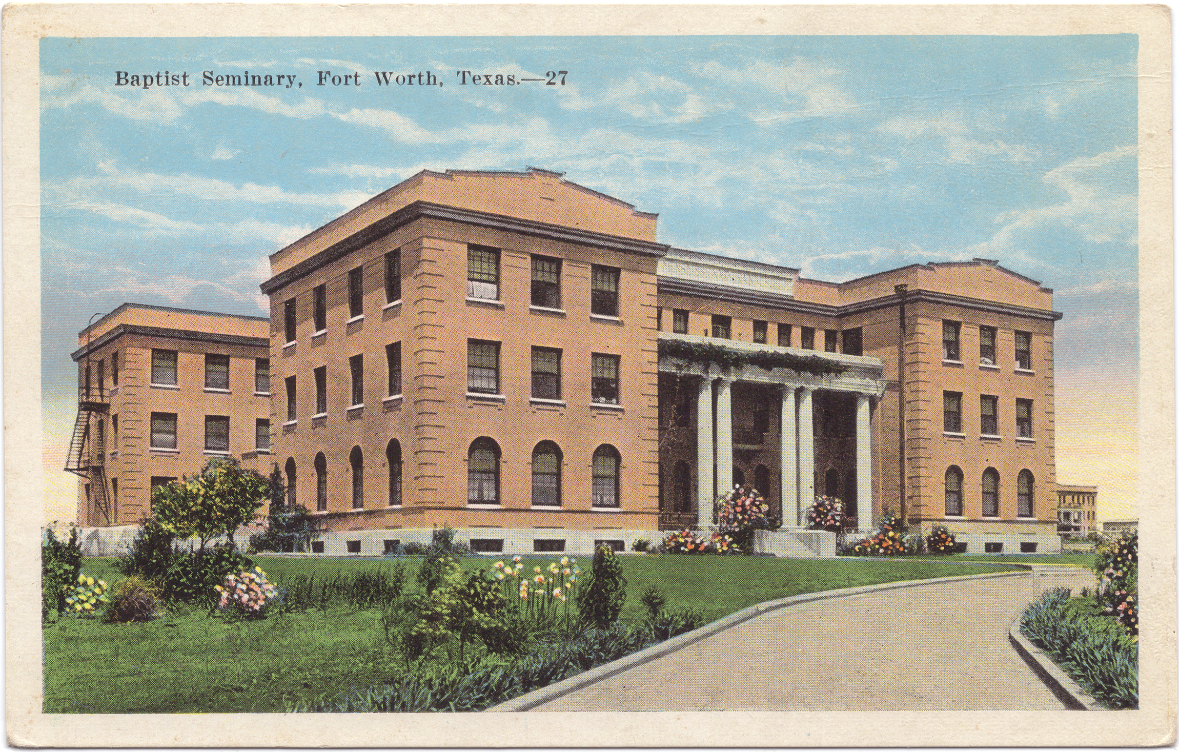 The postcard features a photo of the front of the building.
