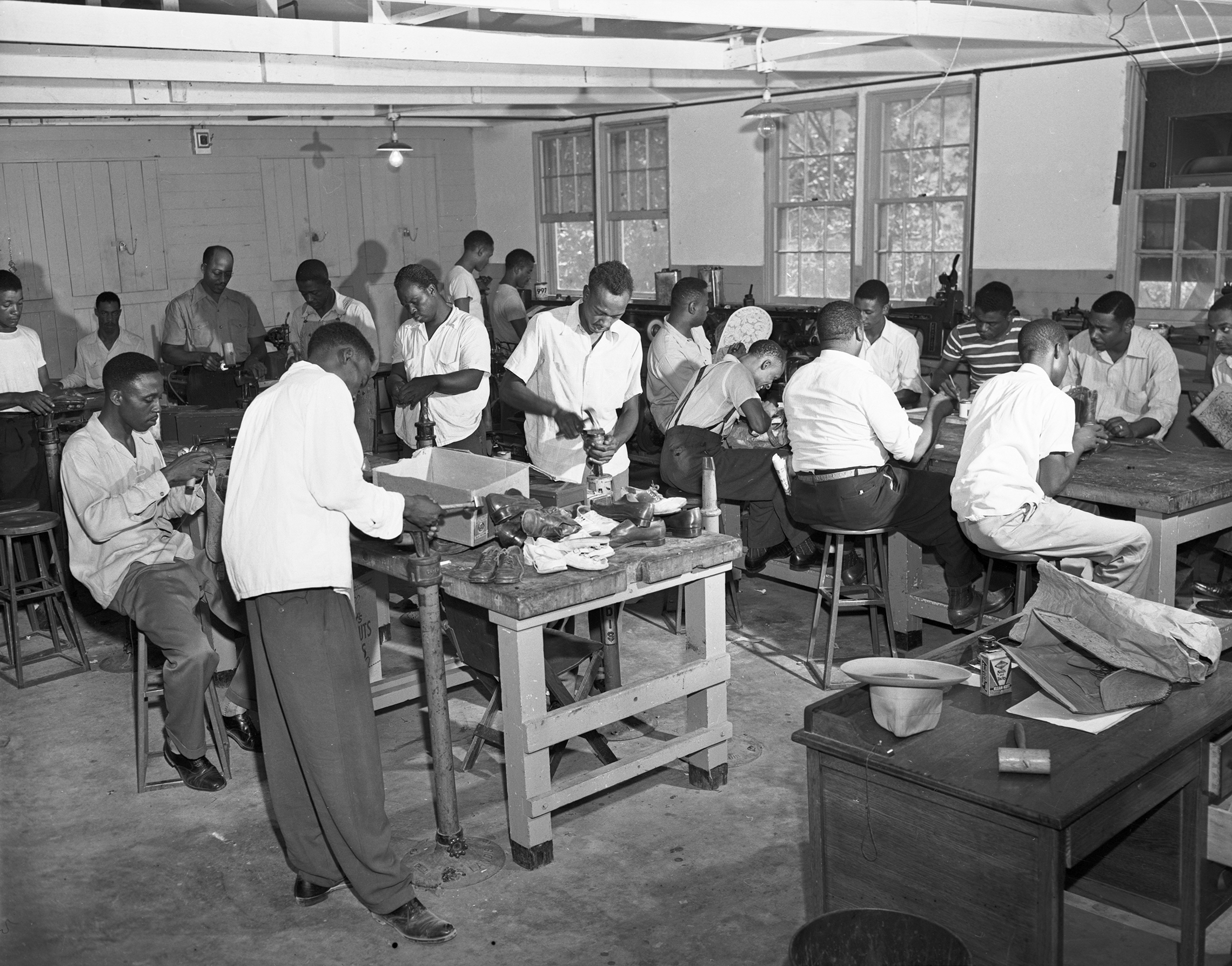 Shoe repair class at work at I. M. Terrell High School.
