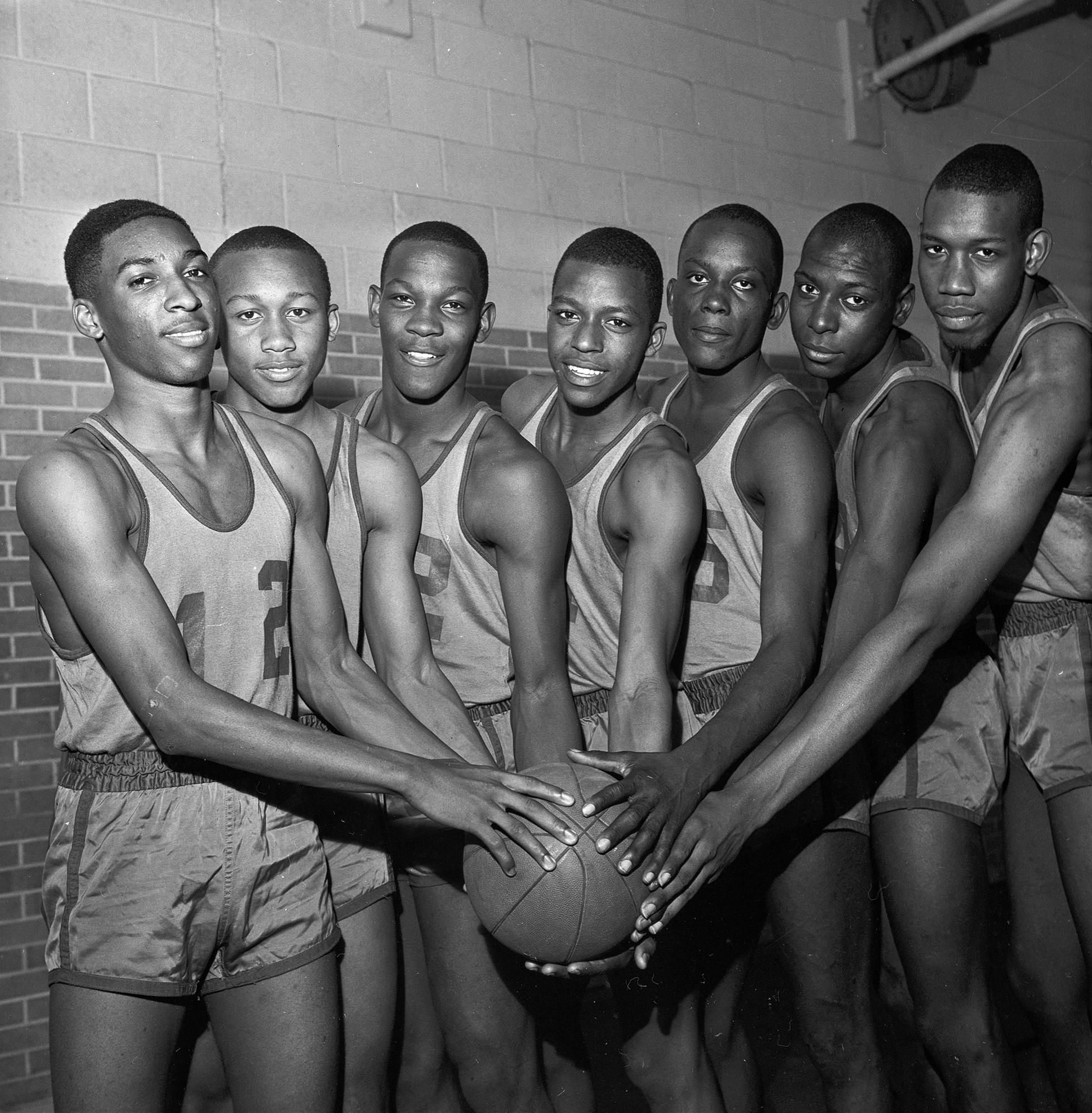 Leading I. M. Terrell to the Class 4A African-American high school basketball championship were, from left to right, Wayne Lewis, Edward Sanders, Sherman Evans, Charles Jefferson, Nathaniel Carroll, Ollie Ledbetter, and James Cash.