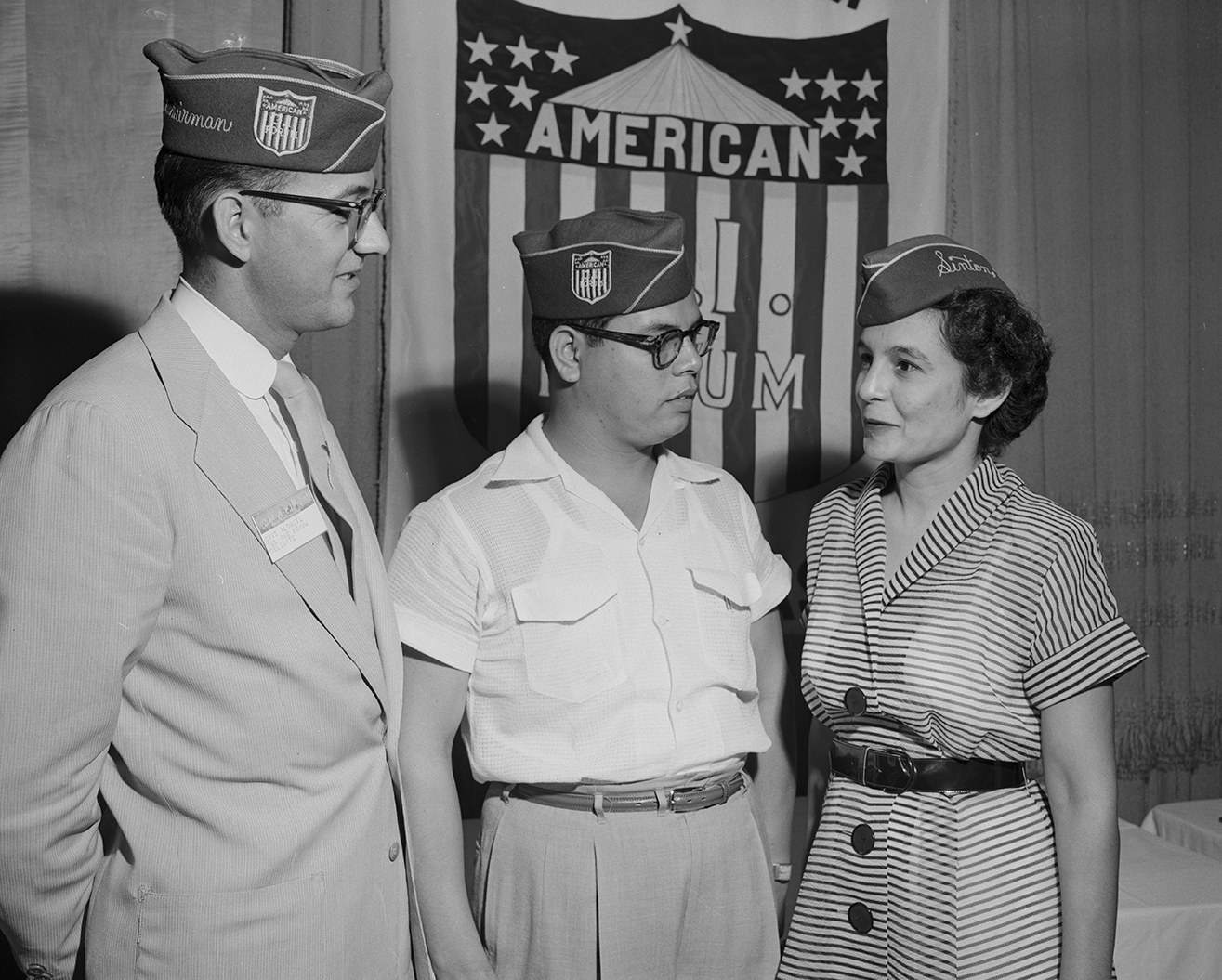 Officers of the American GI Forum of Texas, 1954. Chris Aldrete of Del Rie, left, state chairman, Mike Ferdin of Corpus Christi, center, and Mrs. Elida DeAses of Sinton.