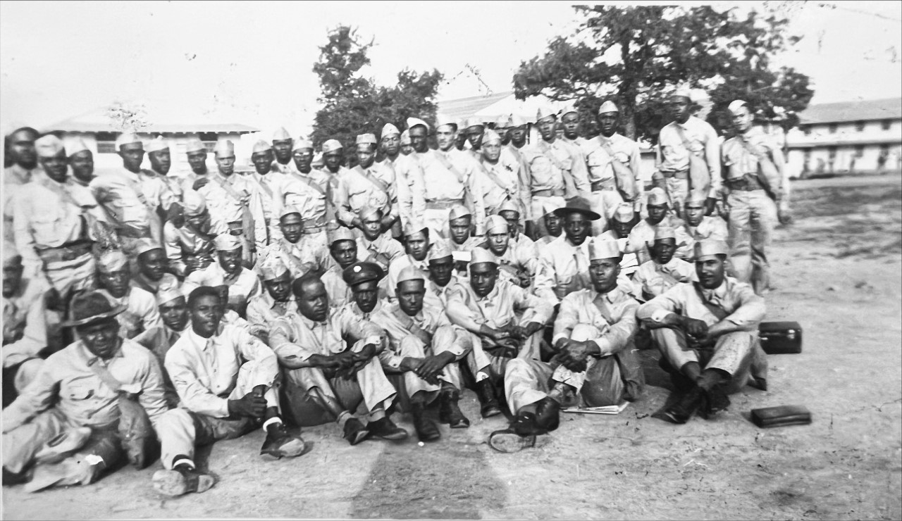 Group photograph of the 614th Tank Destroyer Battalion. African-American men in WWII uniforms.