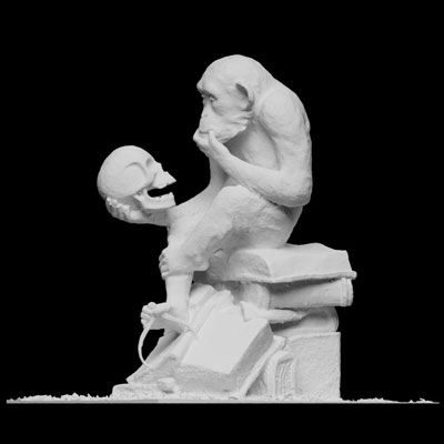 3D-printed sculpture of monkey sitting on books and holding a human skull