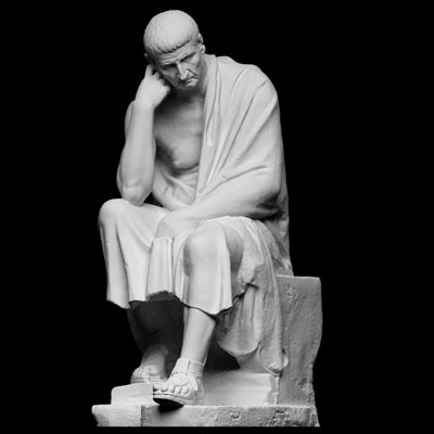 3D-printed sculpture of old man in toga sitting on a rock and deep in thought
