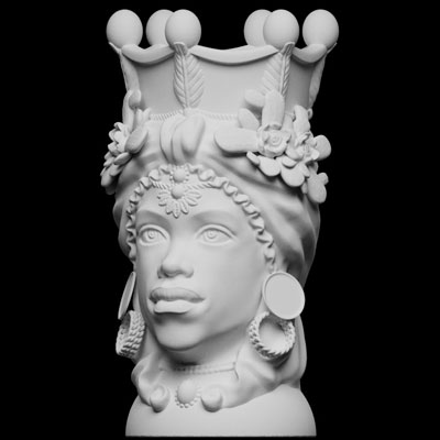 3D-printed bust of Moorish woman in elaborate head dress and earrings