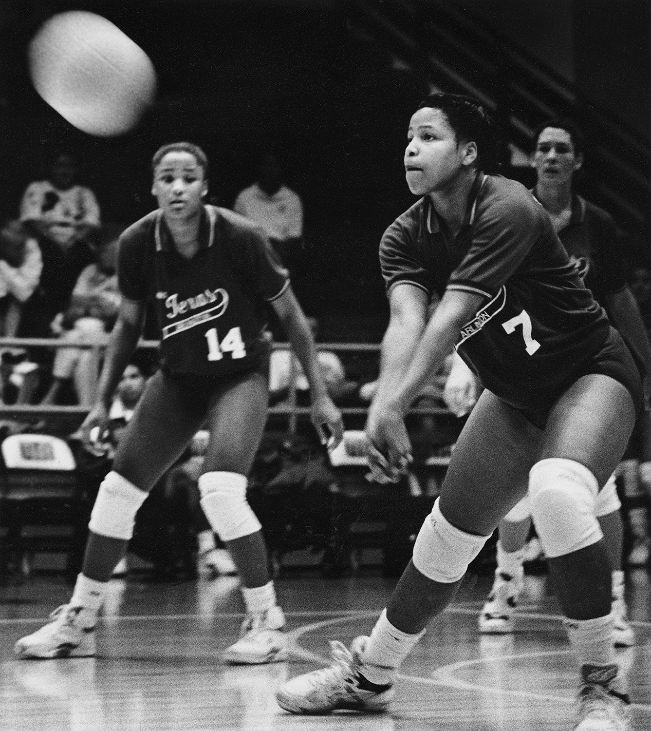 Black and white photo of a volleyball game.