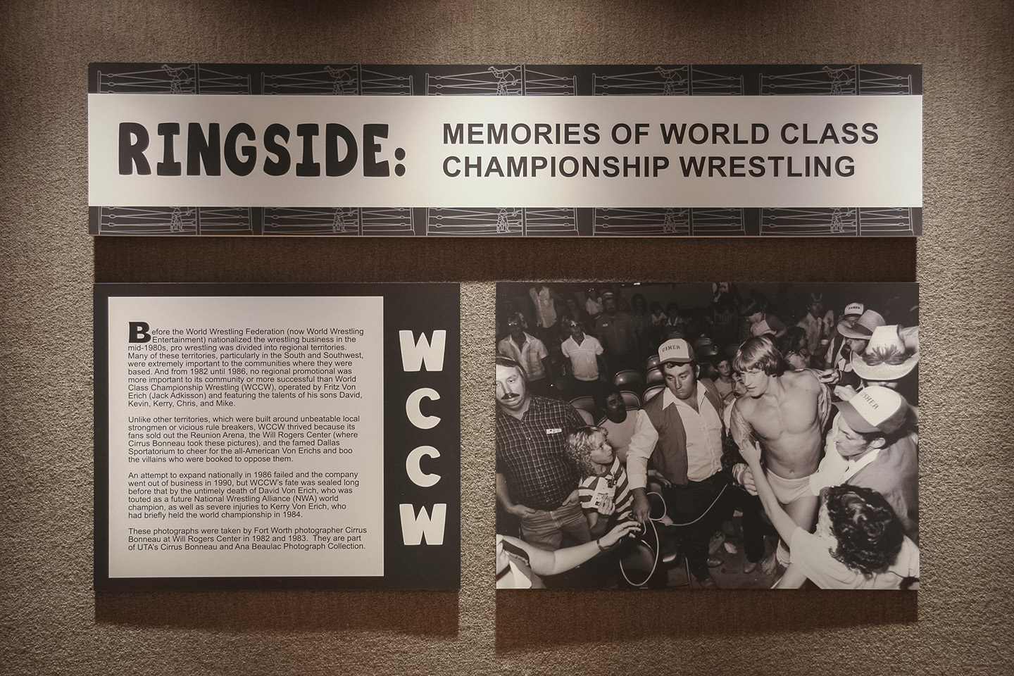 Color digital photo of three exhibit panels, the title reading "Ringside: Memories of World Class Championship Wrestling" with a photo panel at bottom right and a text panel at bottom left.