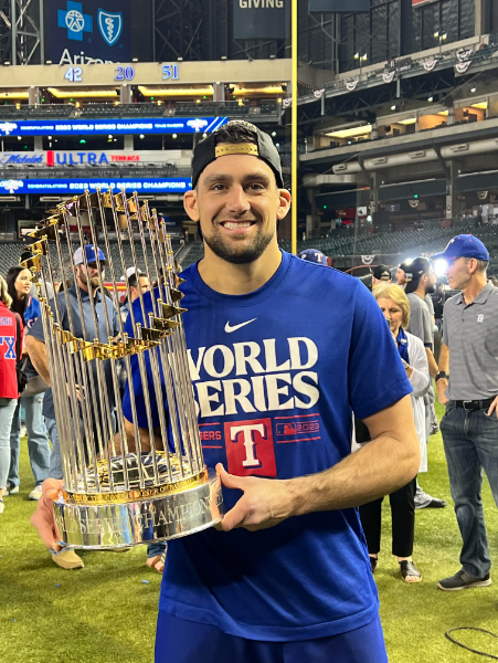 Man holding World Series trophy