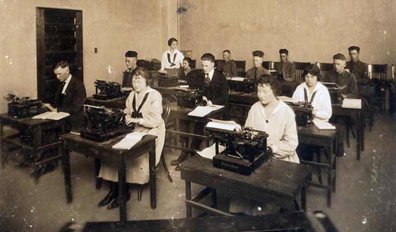1919 photo of Grubbs Vocational College students working at typewriters