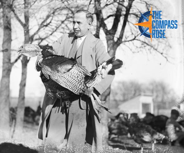 Amon G. Carter holding a turkey
