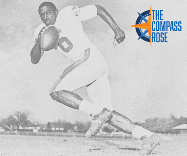 Action photo of ASC quarterback Carl Williams with The Compass Rose in the top right corner.