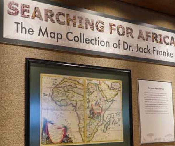 Title board for Searching for Africa exhibit: The Map Collection of Dr. Jack Franke