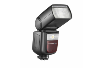 Image showcasing a Panasonic camera flash kit, including a powerful external flash unit and accessories for enhanced lighting in photography.