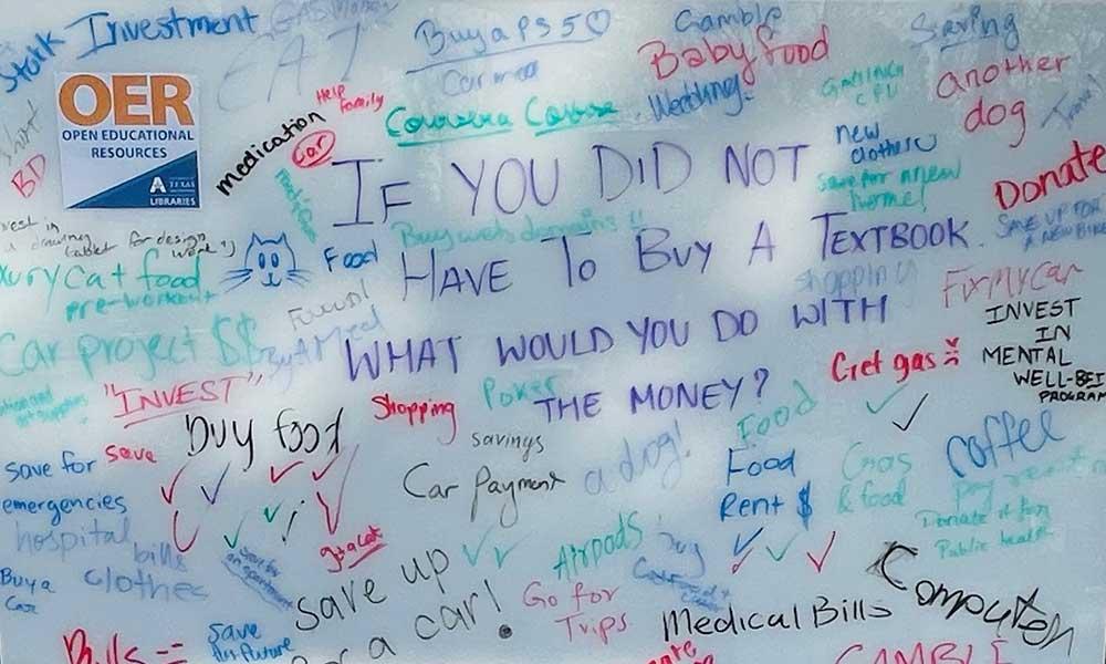 white board where student write what they would do with their money if they didn't have to buy textbooks
